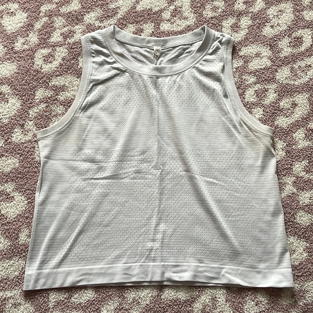 Light blue lululemon mesh muscle tank size 4